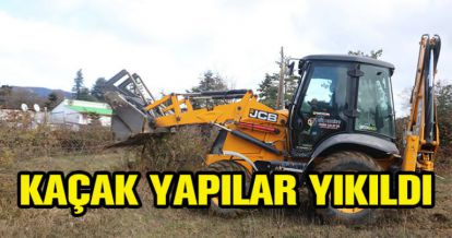 KAÇAK BAHÇE VE ÇİTLER YIKILDI