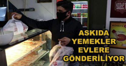 ASKIDA YEMEKLERİ EVLERE GÖNDERİYORLAR