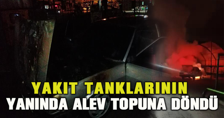 Akaryakıt istasyonuna park edilen otomobil alev alev yandı