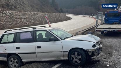 BOLU'DA DEVRİLEN OTOMOBİLDEKİ 2 KİŞİ YARALANDI