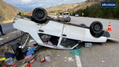 DEVRİLEN OTOMOBİLDE 3 KİŞİ YARALANDI