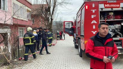 OĞLUNUN EVDE ÇIKARDIĞI YANGINI SÖNDÜREN ANNE YARALANDI