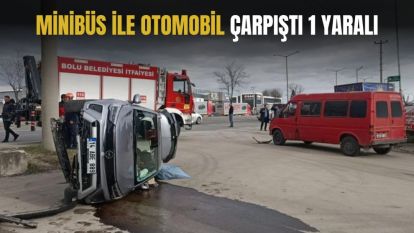 Minibüsle çarpışan otomobil yan yattı