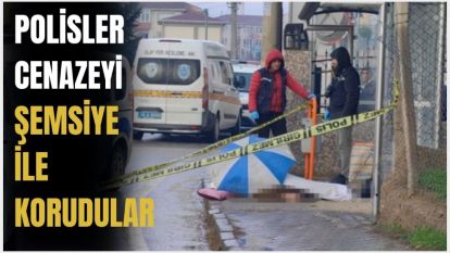 Yere düşen yaşlı adam hayatını kaybetti, cenazeyi şemsiye ile korudular