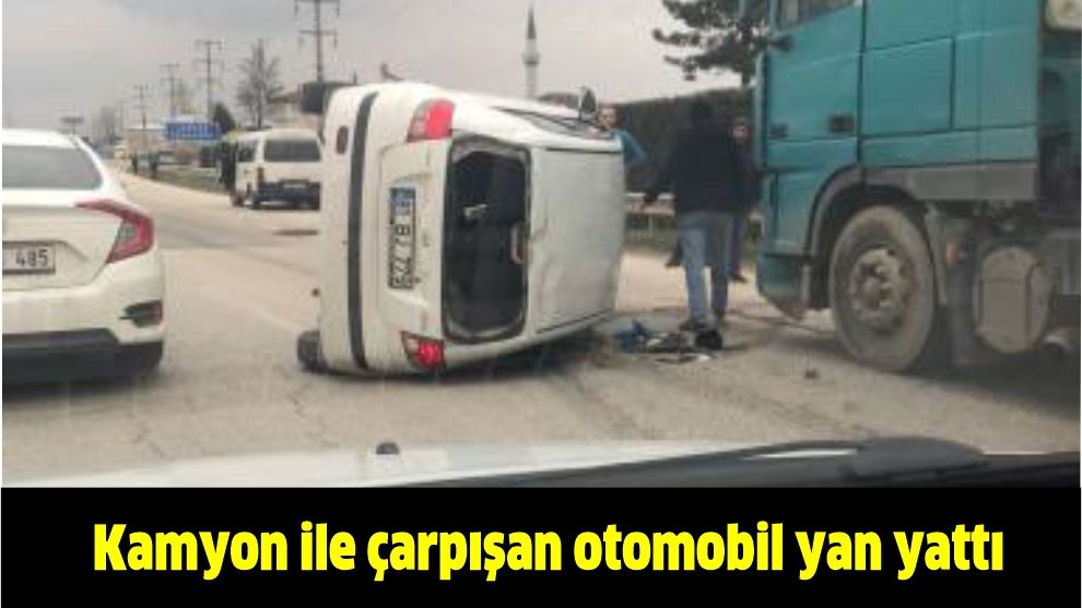 Kamyon ile çarpışan otomobil yan yattı
